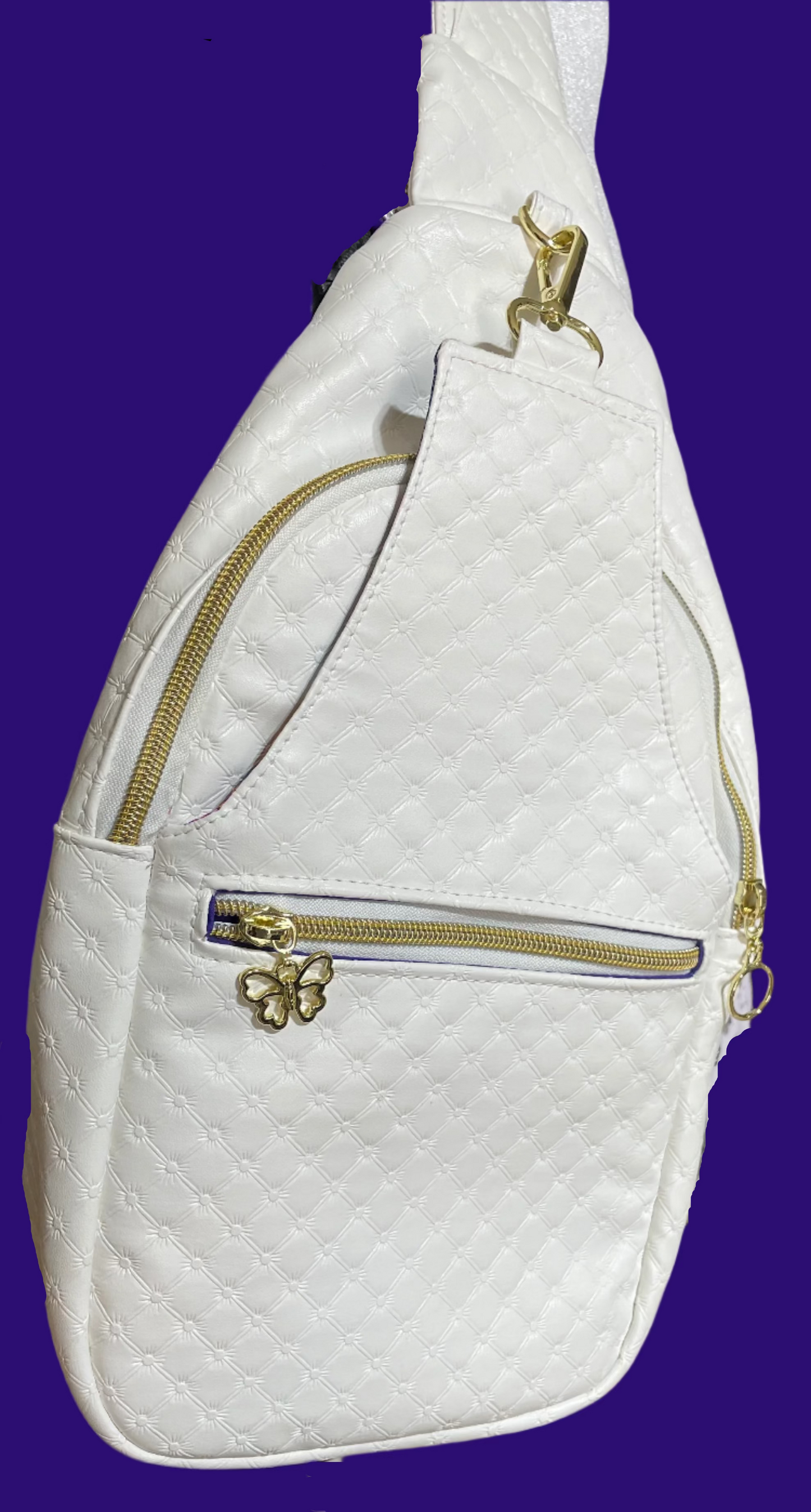 White Diamond embossed faux leather Sling purse with gold zippers and Butterfly golden hardware.